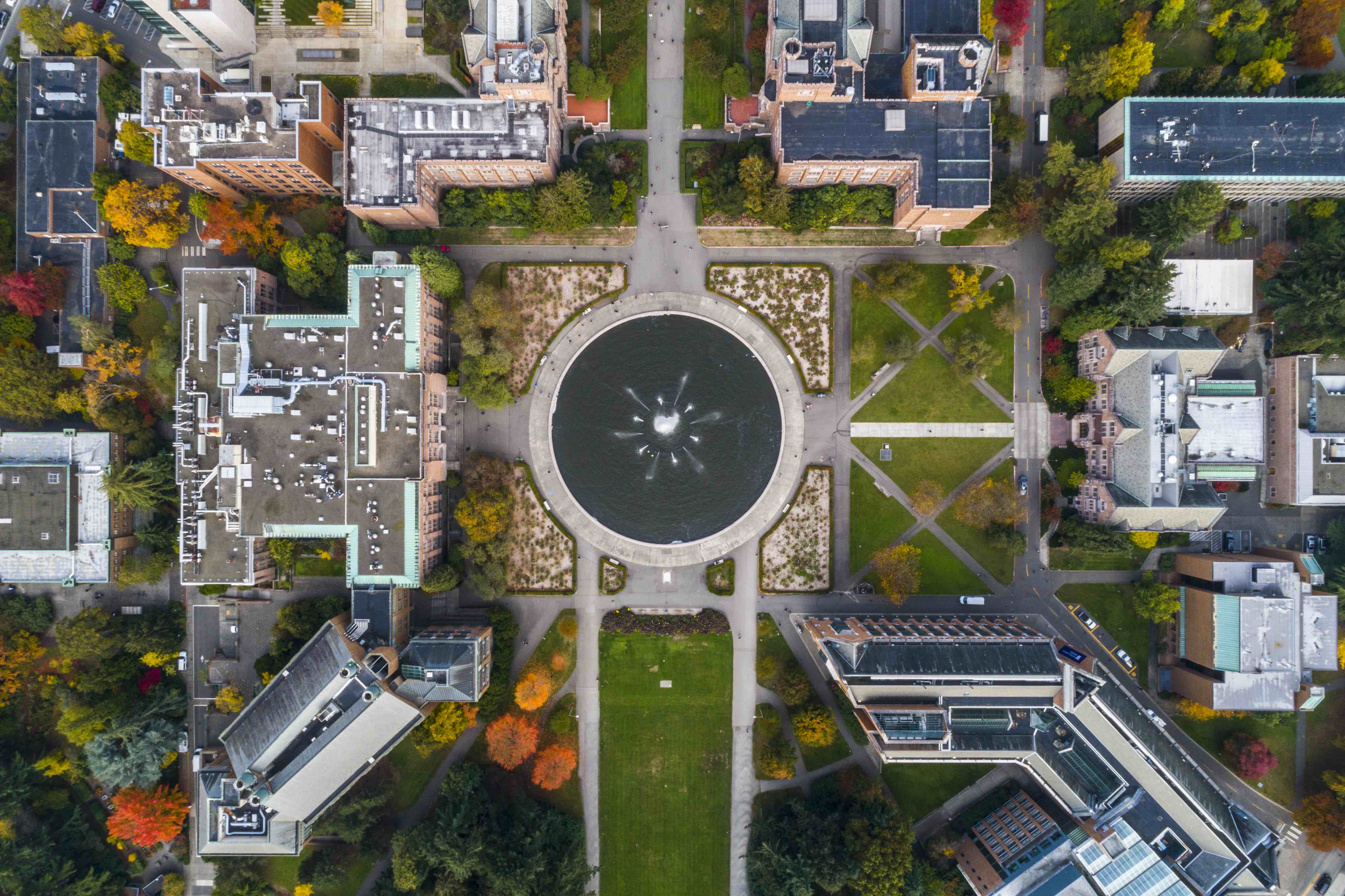 Arial view of a fountain and gothic buildings