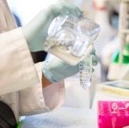 Hands using lab equipment